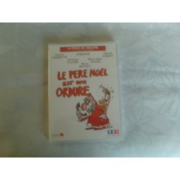 Le Père Noël est Une...